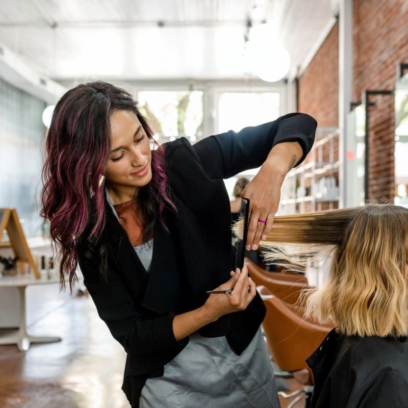Hair Stylist Trimming Hair in Stanwood, Washington